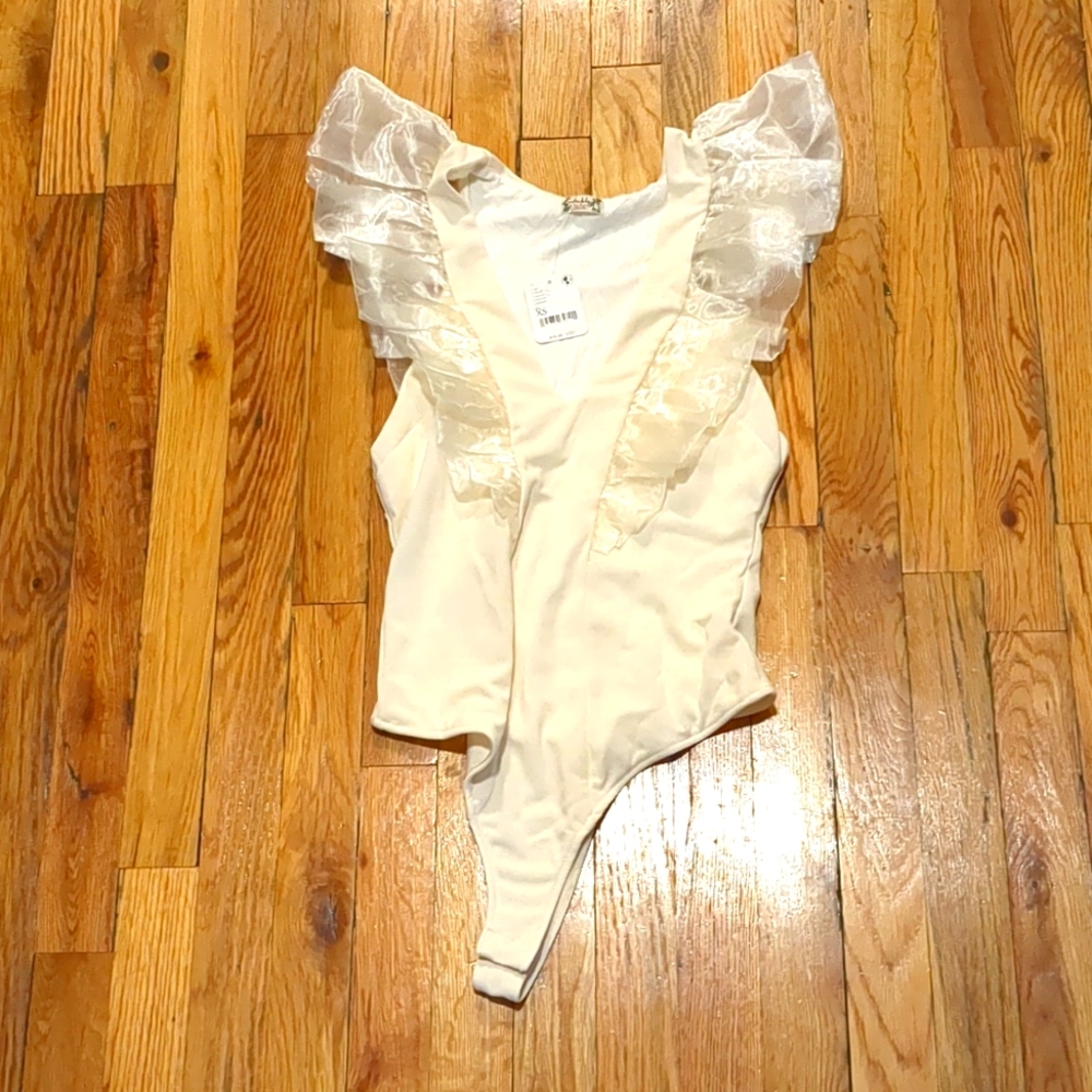 NWT intimately Free People ivory bodysuit with ruffled sleeves